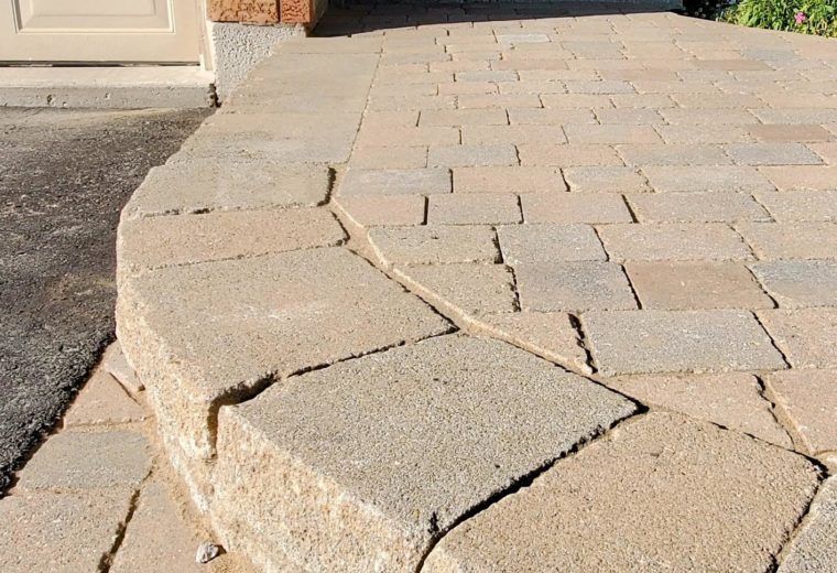 Landscaping Toronto - A driveway built with brick pavers and steps, crafted by Terrastone Landscaping.